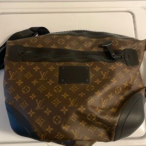 Very lightly used Louis Vuitton Messenger Satchel Bag